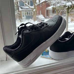 Black Nike Air Force 1’s low LX.